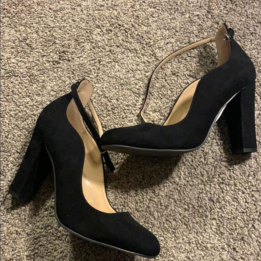 Never worn black Kaari blue heels